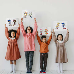TQDGTOY Make-a-face sheets displayed on table show 24 stickers for crafts.
