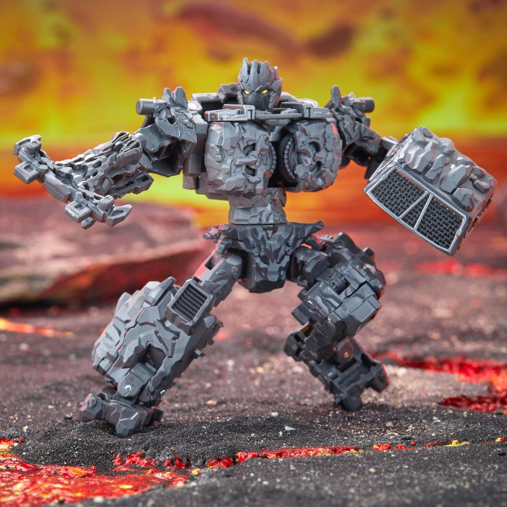 Transformers Magneous rock axe accessory is included for action-ready poses.