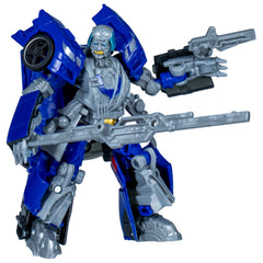 Transformers Studio Series Wheeljack Que robot-to-car conversion for dynamic display.