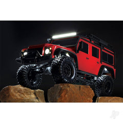Traxxas 8026X LED rock light kit installed on TRX frame demonstrating rugged lighting