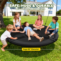 Adults and kids enjoying Trekassy saucer swing together