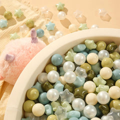 TRENDPLAY Star Ball Pit Balls stored in bag for tidy cleanup.
