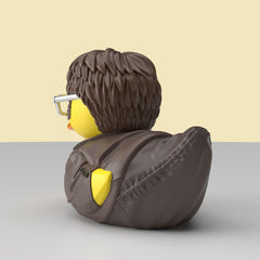 TUBBZ mini cosplaying duck Dwight Schrute on desk display, pop culture charm.