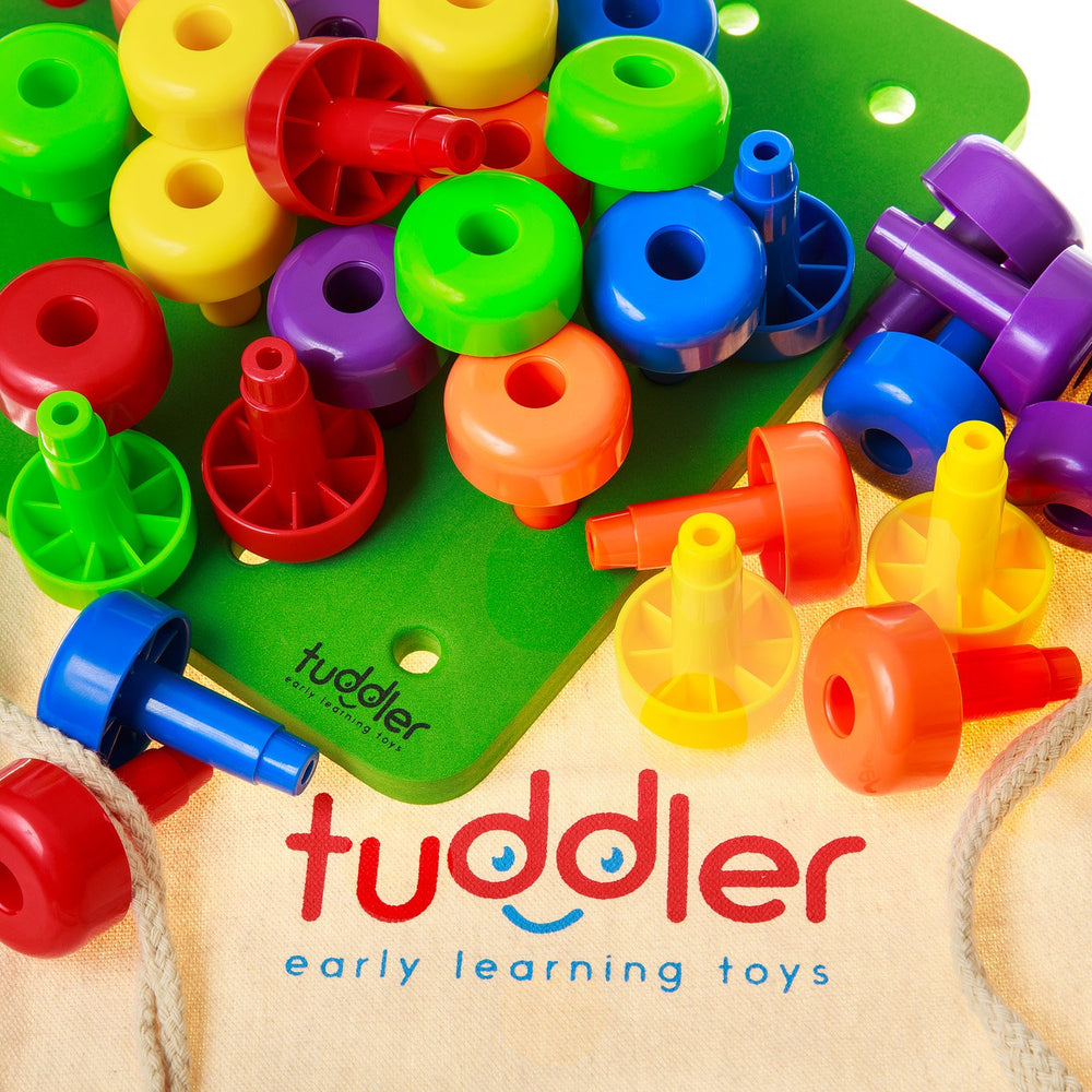 Tuddler green baseboard showcases safe, edge-free play for toddlers.