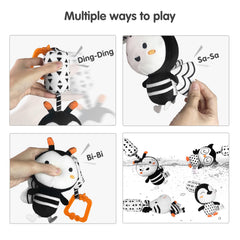 TUMAMA Kids penguin rattle supports sensorimotor play with soft squeeze sounds.