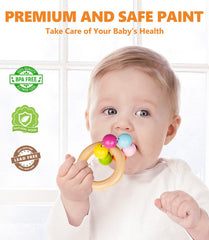 TUOWITA round rattle encourages grasping and auditory awareness during play.