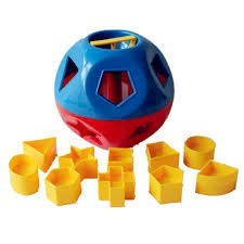 Tupperware Shape-O shapes inside the ball ready for sorting exploration.
