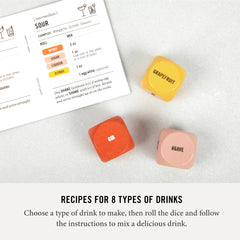 Two Tumbleweeds dice-liqueur near a tasting tray for varied flavor ideas