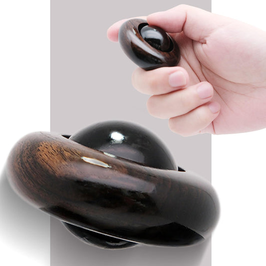 Tybasthe UFO roller in hand for tactile focus and stress relief