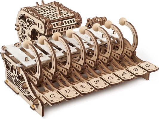 UGEARS Celesta assembly pieces show precision wooden parts for a rewarding build.