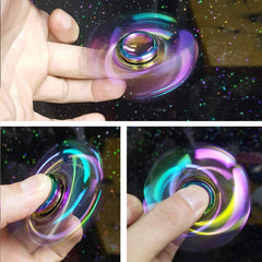 Umnodobn rainbow fidget spinner in yellow, tactile metal toy for calm breaks.