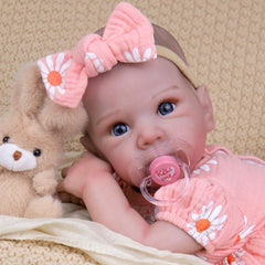 UOFTKIZ 20in doll with pink bow, ideal cuddle buddy for kids.