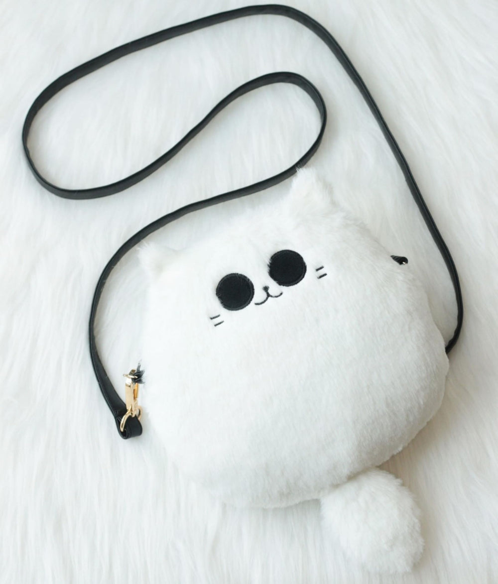 Uomieefy Gojocat plush bag displayed as collectible alongside figures