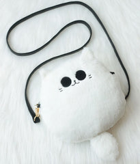 Uomieefy Gojocat plush bag displayed as collectible alongside figures