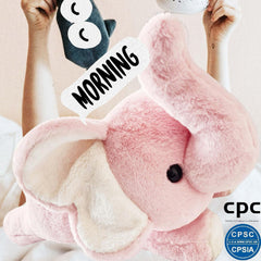 uoozii pink elephant heating pad being microwaved for warmth