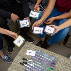 USAOPOLY Blank Slate playing setup showing simple setup and rules