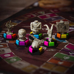 USAOPOLY Trivial Pursuit Horror Ultimate Edition Wedges and Rulebook organize the game.
