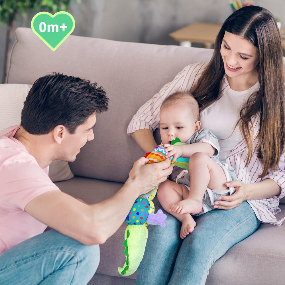 Ussybaby crocodile caterpillar toy shown during tummy time play