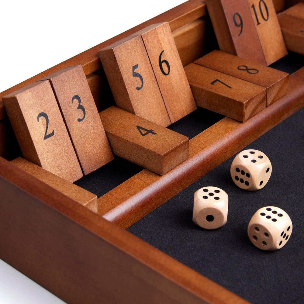 VAMSLOVE Shut The Box dice roll action captures quick, engaging rounds.