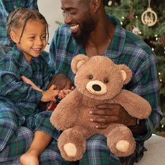 Vermont Teddy Bear Cuddly Soft surface-washable fur makes cleanup easy after adventures.