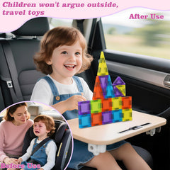 Vrythn Kids playing with magnetic tiles on a plane or car.