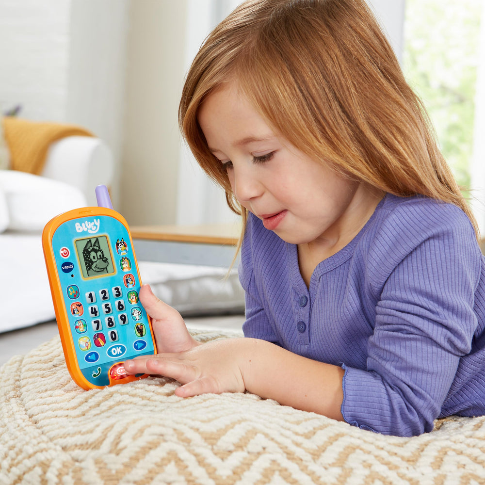 VTech Bluey Learning Mobile Phone in use demonstrates creative activity with microphone.