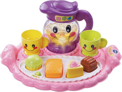 VTech Learn & Discover Pretty Party Playset pitcher light-up for interactive pretend tea time.