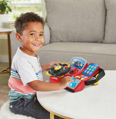 VTech Ride & Learn Racer child playing scene highlights portable, screen-based education on the go.