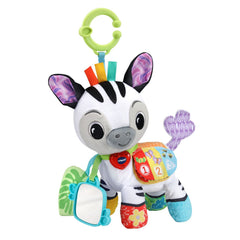 VTech Take Me With You Zebra ribbon tags invite safe teething and grasping.