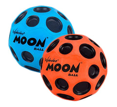 Waboba Moon Ball 2-Pack in color variation bouncing on water for outdoor play