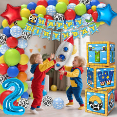 Wakeys Two Infinity and Beyond cake topper crowns the birthday cake.