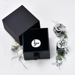 Wareon stainless steel dice engraved with six food options for a tactile keepsake.
