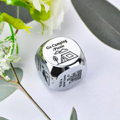 Wareon stainless steel dice close-up highlighting engraved lettering for lasting use.