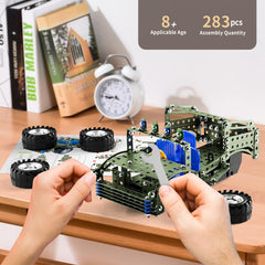 Watudou model truck parts laid out for careful assembly.