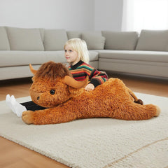WDXDSOB Highland Cow pillow on couch complements farmhouse style.
