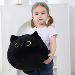 WeBingo Black Cat Plush provides gentle nap support on couch.