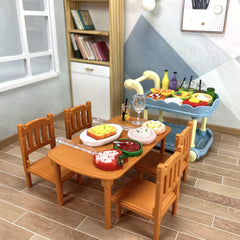 Wehoo cake and treats bring lifelike detail to dollhouse tables