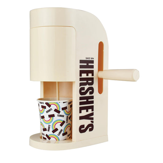 Well Played Hershey's Chocolate Drink Maker pours into a glass for a creamy treat.