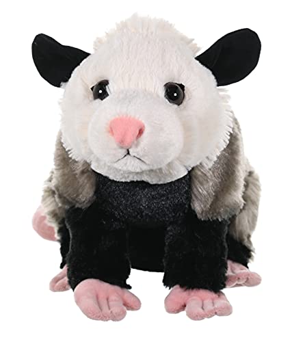 Wild Republic opossum plush in lounging pose, lightweight travel companion.