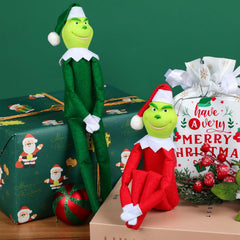 Detail-rich Winblot elf plush with adjustable limbs for versatile holiday arrangements.