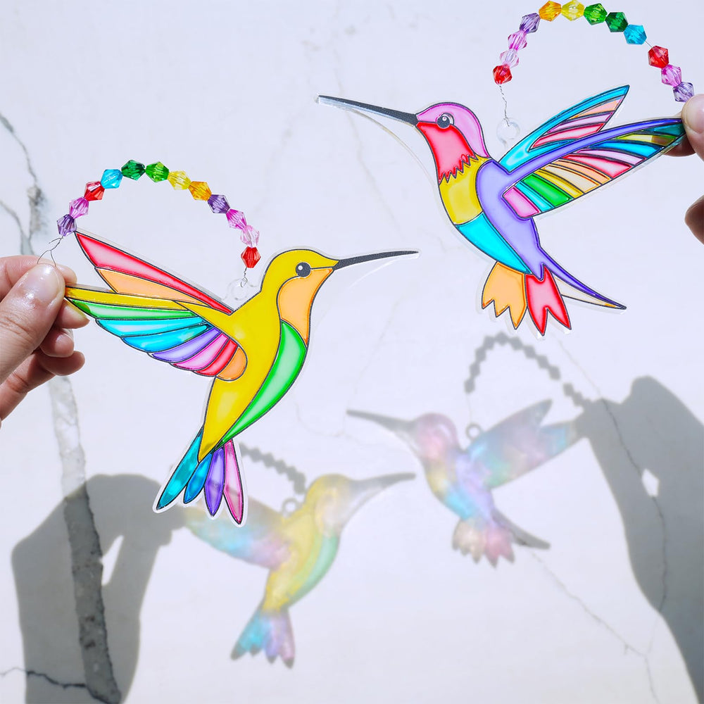 Winlyn acrylic beads add sparkle and texture to each bird.