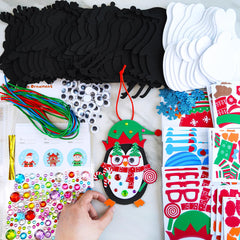Winlyn glitter snowflake stickers add festive sparkle to penguin crafts.