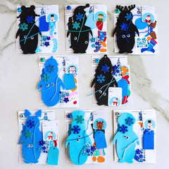 Winlyn glitter snowflake stickers add sparkle to holiday bookmarks.