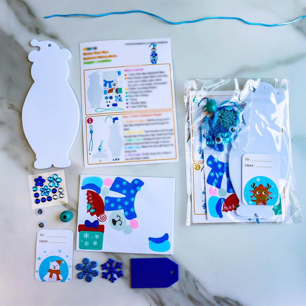 Winlyn polar bear bookmark kit includes glitter snowflakes to add sparkle.