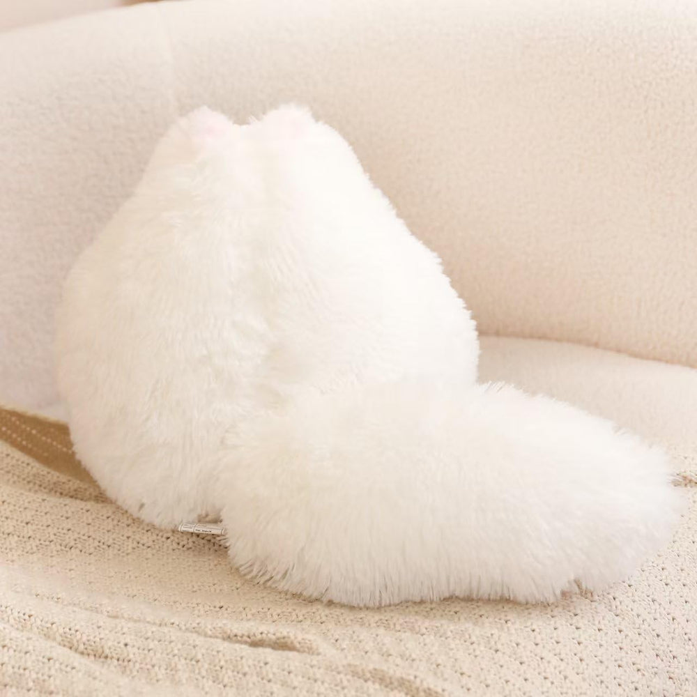 Winsterch white fat cat tummy and tail, charming nursery décor and playmate.