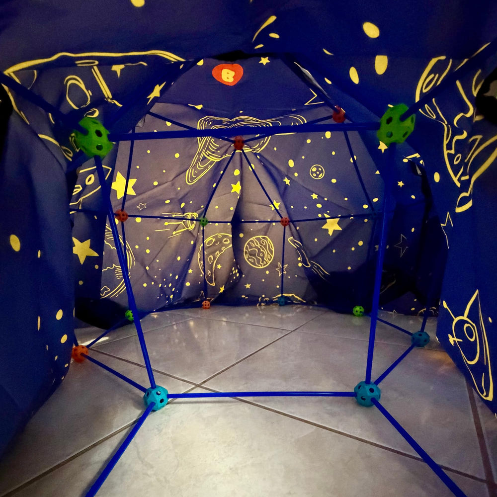 Backyard fort fun with Wizzly Space Blanket Fort Kit, indoor/outdoor versatility.