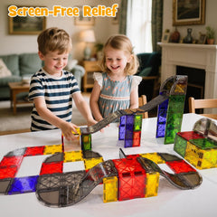 WMXDU children playing with the set to build racing circuits.