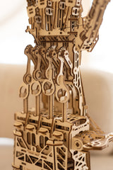 Movable finger mechanisms on Wood Trick Cyber Hand enable interactive demonstrations