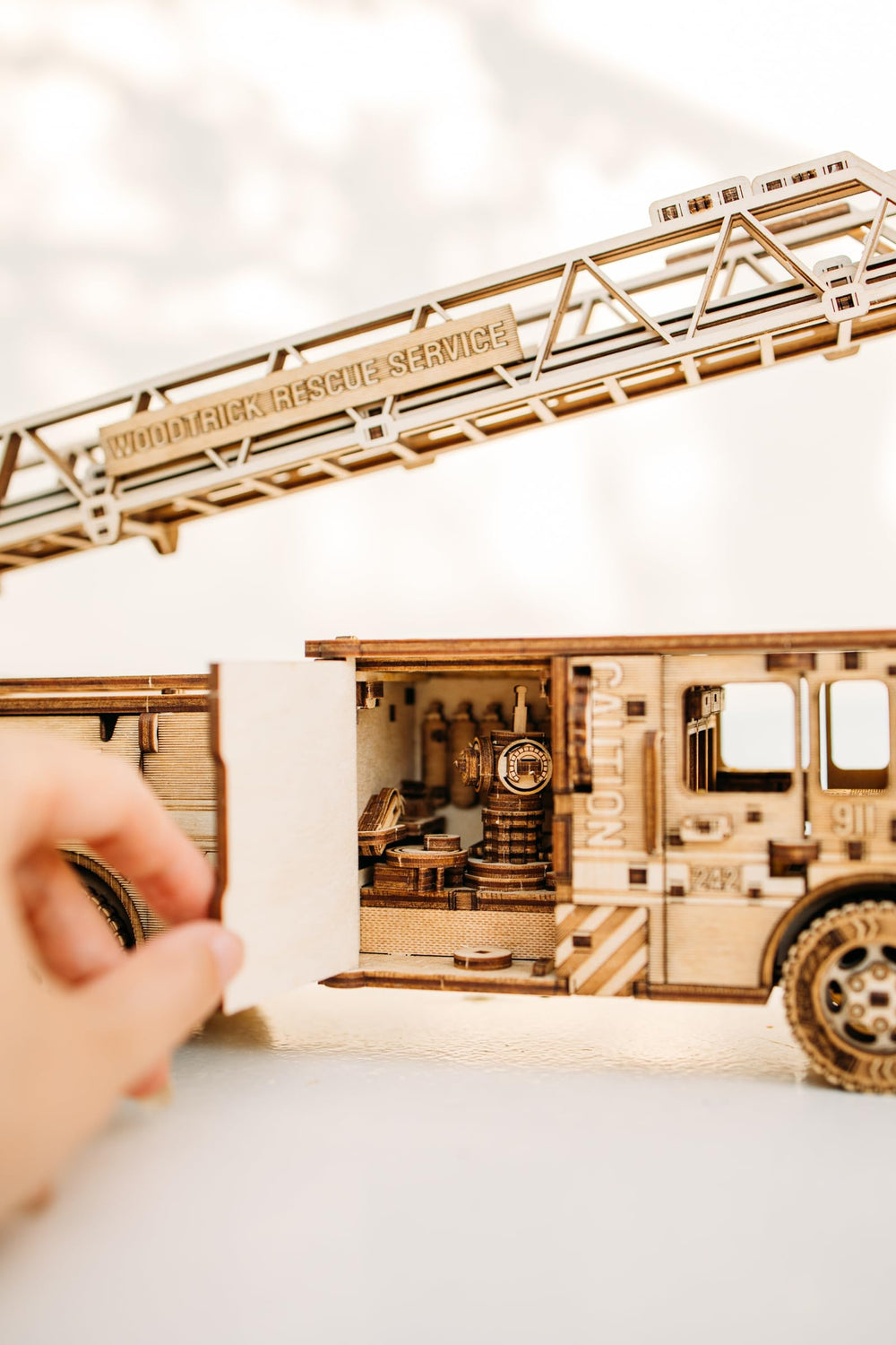 Wood Trick Rescue Firetruck cabin detail highlights authentic-looking driver's area for realism in builds.