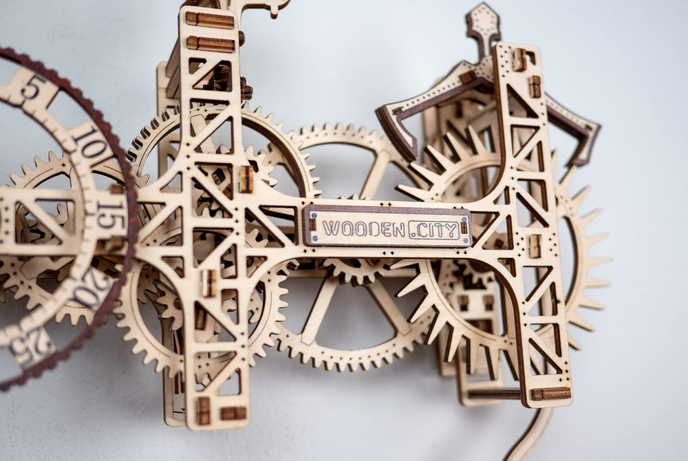 WOODEN.CITY wall clock mounted on wall as decor.